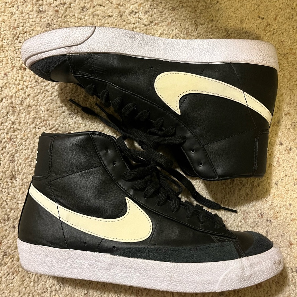 Nike Black High-Top Sneakers with Cream Swoosh